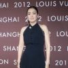 L'actrice Gong Li arrive au défilé automne-hiver 2012-2013 Louis Vuitton présenté à Shanghai. Juillet 2012