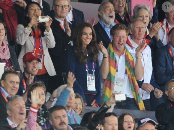 Kate Middleton, le prince William et le prince Harry ont exulté le 5 août 2012 au stade olympique lors du sacre d'Usain Bolt aux JO de Londres, vainqueur du 100m en 9"63.