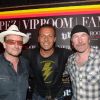 Jean-Roch entouré de Bono et The Edge (U2), au VIP Room de St-Tropez, le vendredi 17 août 2012.