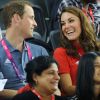 Kate Middleton et le prince William complices au vélodrome de Londres le 30 août 2012 au premier jour des Jeux paralympiques.