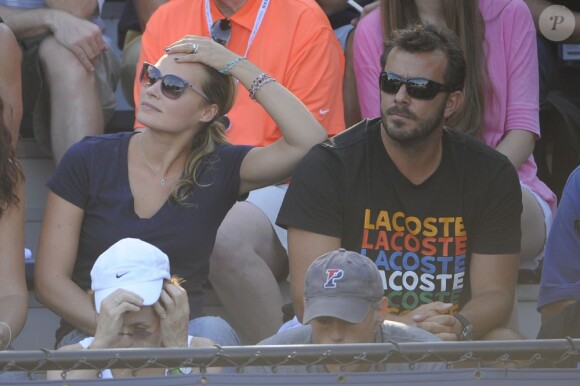 Melanie Maudran et son compagnon Thierry Ascione lors du match de la Française Kristina Mladenovic le 29 août 2012 à l'US Open à New York