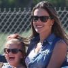 Alessandra Ambrosio et sa fille Anja, sourire aux lèvres, s'éclatent dans les attractions du Chili Cook-Off. Malibu, le 2 septembre 2012.