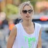 "Time Is Money" pour Karolina Kurkova, qui profite d'un après-midi ensoleillé avec son mari Archie Drury et leur fils Tobin. New York, le 9 septembre 2012.