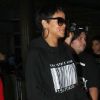 Rihanna, habillée d'un sweater Trapstar d'un legging noir et de baskets Nike Air Yeezy 2, arrive à l'aéroport de Los Angeles. Le 10 septembre 2012.