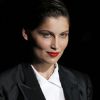 Laetitia Casta à Milan assiste au défilé Dolce & Gabbana dans un superbe smoking noir. Le 23 septembre 2012