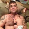Robbie Williams et sa fille Theodora le 21 septembre 2012.