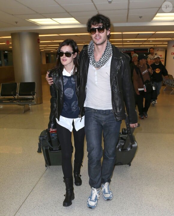 Rumer Willis et son compagnon Jayson Blair lors de leur arrivée à l'aéroport de Miami le 8 novembre 2012