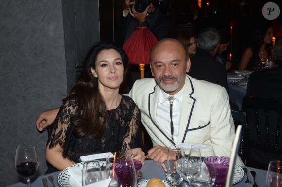 Monica Bellucci et Christian Louboutin, complices au dîner Dior le 2 décembre 2012 à Marrakech