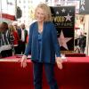 Carole King a le sourire. C'est normal, elle vient de recevoir son étoile sur le Hollywood Walk of Fame à Los Angeles, le 3 décembre 2012.