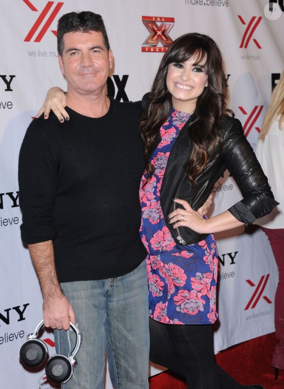 Demi Lovato et Simon Cowell à la soirée X Factor Viewing Party à Los Angeles le 6 décembre 2012.