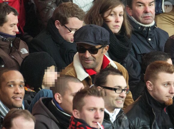 Yannick Noah et son fils Joalukas lors du match entre le PSG et Evian Thonon Gaillard au Parc des Princes à Paris le 8 décembre 2012 à Paris (victoire du PSG 4-0)