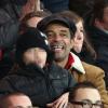 Yannick Noah et son fils Joalukas lors du match entre le PSG et Evian Thonon Gaillard au Parc des Princes à Paris le 8 décembre 2012 à Paris (victoire du PSG 4-0)