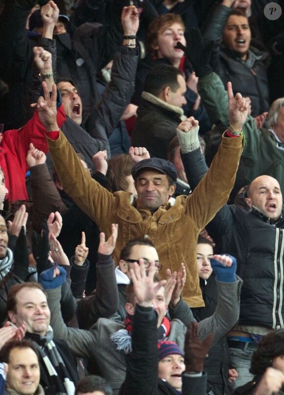 Yannick Noah et son fils Joalukas lors du match entre le PSG et Evian Thonon Gaillard au Parc des Princes à Paris le 8 décembre 2012 à Paris (victoire du PSG 4-0)