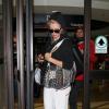 Kim Basinger et sa fille Ireland Baldwin arrivent à l'aéroport de Los Angeles le 10 décembre 2012.