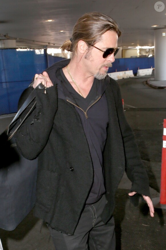 Brad Pitt arrivant à l'aéroport de Los Angeles le 8 janvier 2013