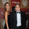 Stacy Keibler et George Clooney lors de la soirée Warner Bros. qui se déroulait après la cérémonie des Golden Globes 2013, au Beverly Hilton Hotel à Los Angeles, le 13 janvier 2013