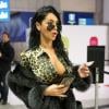 Nabilla à l'aéroport à Roissy Charles de Gaulle le 14 janvier 2013 pour participer à la saison 5 des Anges de la télé-réalite à Miami.