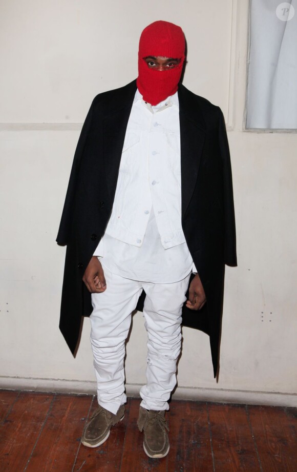 Kanye West assiste au défilé haute couture Maison Martin Margiela printemps-été 2013 à Paris. Le 23 janvier 2013.