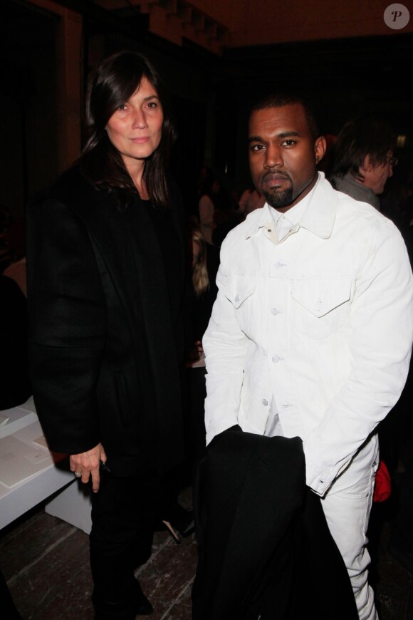 Emmanuelle Alt, rédactrice en chef du magazine Vogue Paris et Kanye West assistent au défilé haute couture Maison Martin Margiela printemps-été 2013 à Paris. Le 23 janvier 2013.