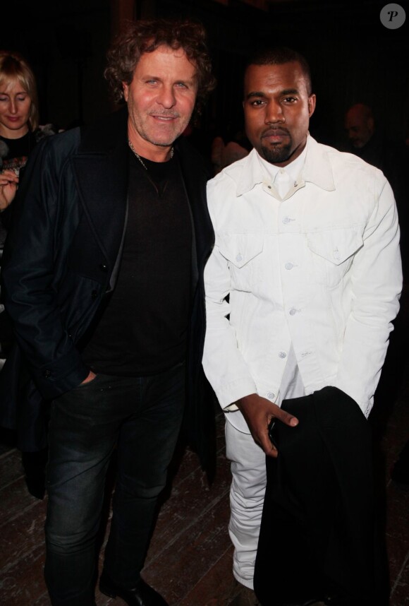 Renzo Rosso et Kanye West assistent au défilé haute couture Maison Martin Margiela printemps-été 2013 à Paris. Le 23 janvier 2013.