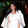 La jolie Kim Kardashian enceinte et Kanye West font du shopping rue Saint Honoré à Paris, le 25 janvier 2013. Ils sont allés chez Hermès, Cartier, Lanvin et Ermanno Scervino.