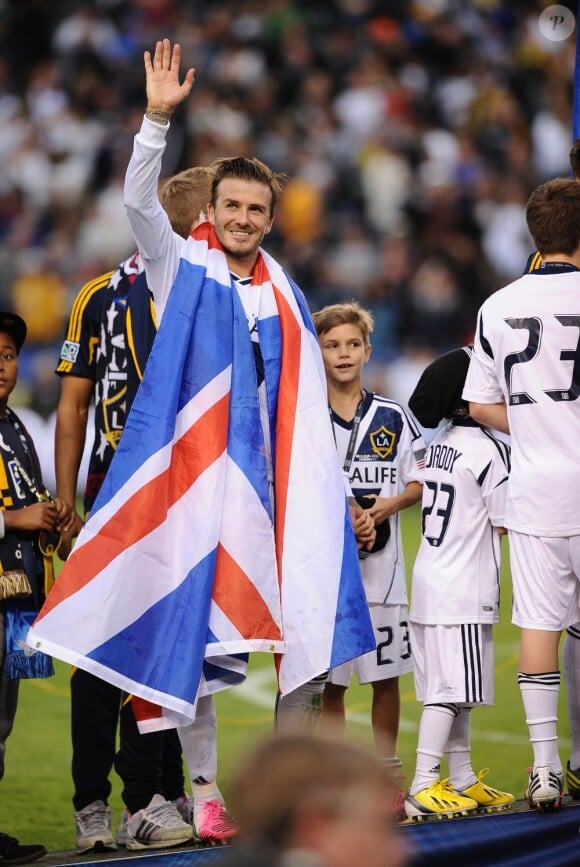 David Beckham et ses fils Brooklyn, Romeo et Cruz le 1er décembre 2012 à Carson City à Los Angeles, après la victoire en MLS du Galaxy