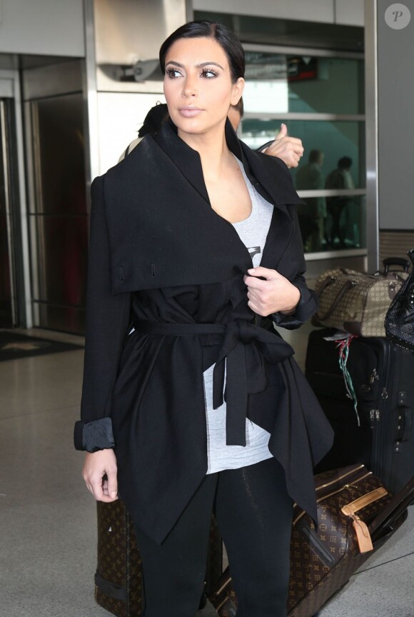 Exclusif - Kim Kardashian arrive à Miami. Elle quittera la ville quelques heures plus tard pour rejoindre Los Angeles. Le 2 février 2013.