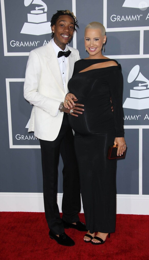 Wiz Khalifa et Amber Rose à la 55e cérémonie des Grammy Awards à Los Angeles le 10 février 2013. Amber Rose portait une robe Donna Karan et Wiz Khalifa un costume Tom Ford.