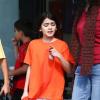 Blanket Jackson (10 ans) sort de son cours de karaté à Los Angeles, le 10 février 2013. Il jeune garçon affiche fièrement sa ceinture orange.