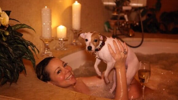 Mariah Carey : Balade en calèche et baisers avec Nick, bain... avec son chien