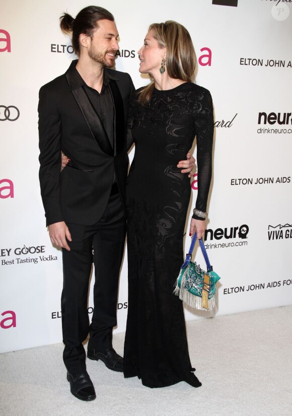 Sharon Stone et son petit ami à la soirée organisée par la fondation Elton John en marge des Oscars, le 24 février 2013 à Los Angeles.
