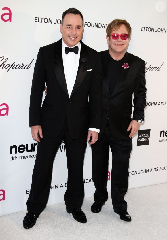 David Furnish et Elton john à la soirée organisée par la fondation Elton John en marge des Oscars, le 24 février 2013 à Los Angeles.