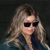 Exclusif - La chanteuse Fergie, 37 ans et enceinte, arrive à l'aéroport de Roissy Charles de Gaulle. Elle se rendra ensuite au Zénith de Paris pour assister au concert de Kanye West. Le 25 février 2013.