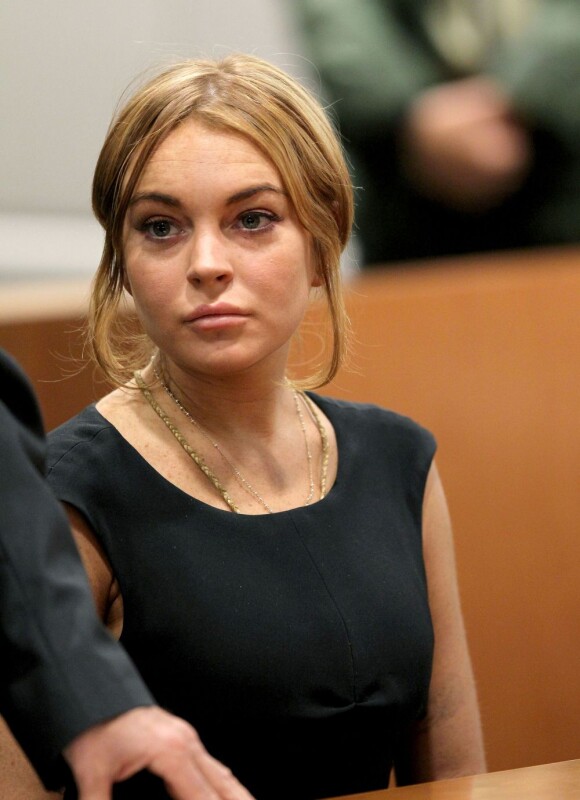 L'actrice Lindsay Lohan et son avocat Mark Heller au tribunal de Los Angeles, le 30 janvier 2013. Le procès a été repoussé au 18 mars 2013.
