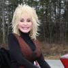 Dolly Parton en calèche le Festival des Nations, au parc Dollywood à Pigeon Forge, dans le Tennessee, le 23 mars 2013.