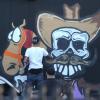 Chris Brown un véritable artiste ! Le chanteur a fait des graffitis pour une oeuvre de charité sur un mur à Miami, le 26 mars 2013.