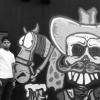 Le chanteur Chris Brown fait des graffitis pour une oeuvre de charité sur un mur à Miami, le 26 mars 2013.