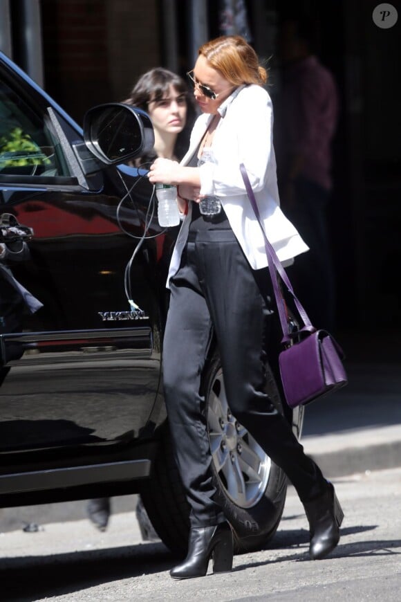 Exclusif - Lindsay Lohan et sa soeur Ali dans les rues de New York le 9 avril 2013.