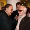 Guy Béart et Charles Aznavour - Vernissage de l'exposition "Trenet : Le Fou chantant de Narbonne à Paris" à la Galerie des Bibliothèques à Paris, le 11 avril 2013.
