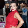 Kim Kardashian, enceinte et fière de son baby bump, lorsqu'elle présente son parfum Glam au Kardashian Khaos Store à Las Vegas, le 13 avril 2013