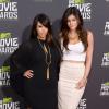 Kim Kardashian et sa petite soeur Kylie Jenner aux MTV Movie Awards. Los Angeles, le 14 avril 2013.
