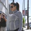 Kim Kardashian, enceinte, arrive aux Tracy Anderson Studios à Los Angeles. Le 16 avril 2013.