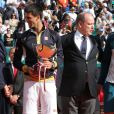  Le prince Albert et la princesse Charlene de Monaco assistaient le 21 avril 2013 à la finale du Rolex Masters de Monte-Carlo opposant Rafael Nadal et Novak Djokovic. Victorieux, le Serbe a eu droit à une chaleureuse étreinte de Charlene et s'est vu remettre le trophée du tournoi par le prince Albert. 
