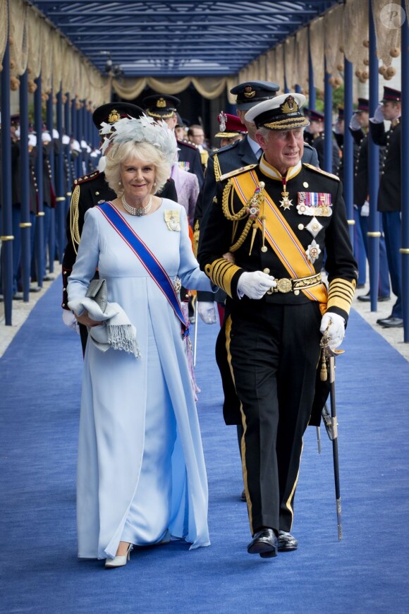 Camilla Parker Bowles et le prince Charles à Amsterdam le 30 avril 2013 après la prestation de serment du roi Willem-Alexander des Pays-Bas.