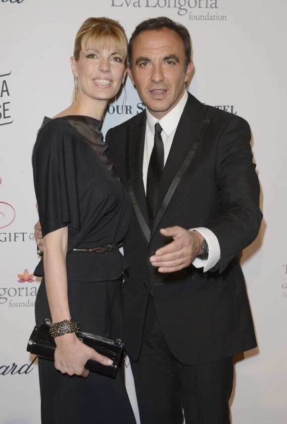Nikos Aliagas et sa compagne Tina Grigoriou lors de la 4e édition du "Global Gift Gala", coprésidée par Eva Longoria et présentée par Nikos Aliagas au Georges V le 13 mai 2013 à Paris