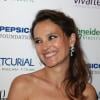Virginie Ledoyen arrive radieuse à la soirée Planet Finance dans le grand salon du Carlton à l'occasion du 66e Festival de Cannes le 16 mai 2013.