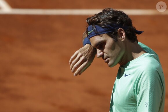 Kei Nishikori élimine Roger Federer en 1/8eme de finale à Madrid le 9 mai 2013.