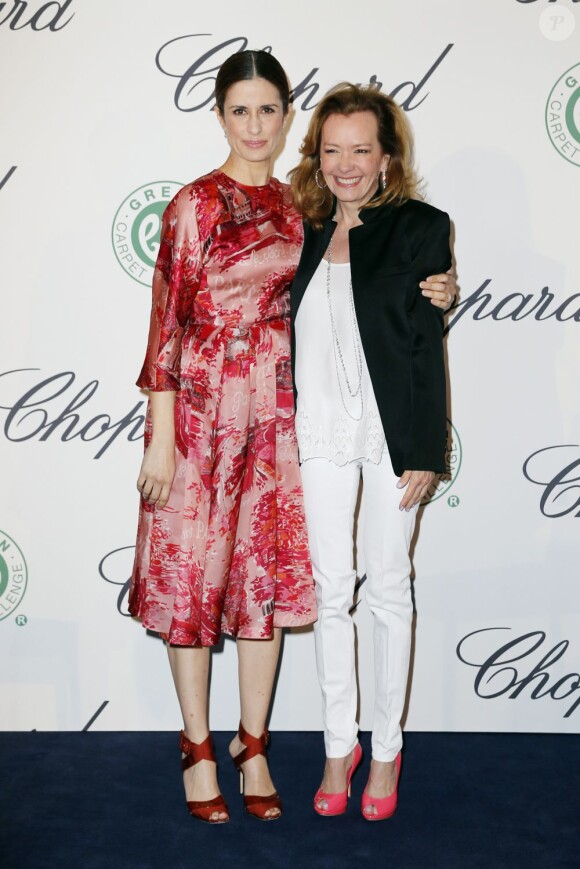 Livia Firth et Caroline Scheufele lors du photocall avant le déjeuner sur la terrasse Chopard à l'Hôtel Martinez lors du 66e festival de Cannes le 17 mai 2013.