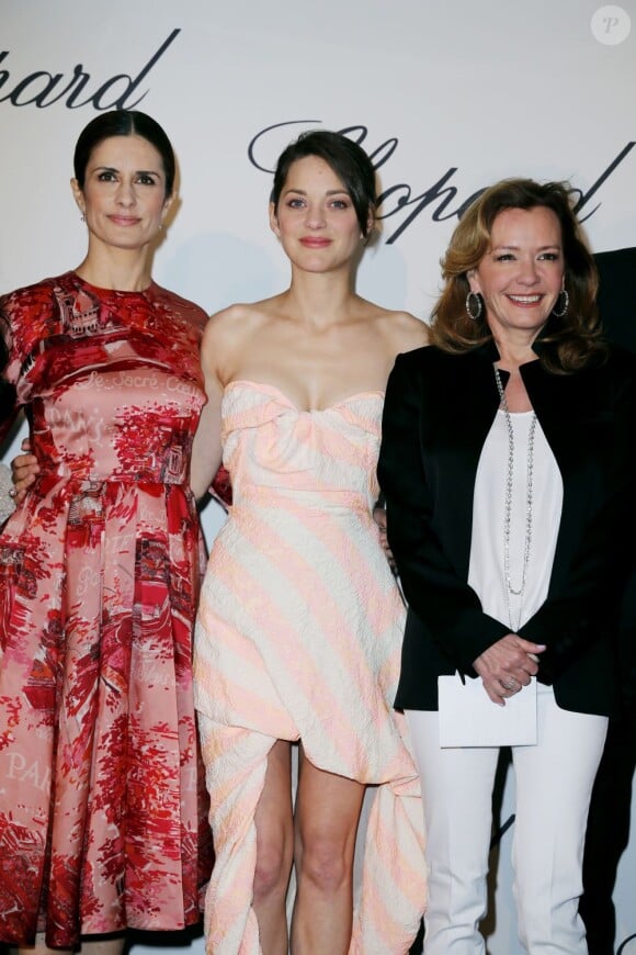 Livia Firth, Marion Cotillard et Caroline Scheufele lors du photocall avant le déjeuner sur la terrasse Chopard à l'Hôtel Martinez lors du 66e festival de Cannes le 17 mai 2013.