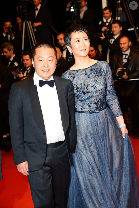 Jia Zhang-Ke et Tao Zhao à la montée des marches du Palais des Festivals à Cannes, le 17 mai 2013.